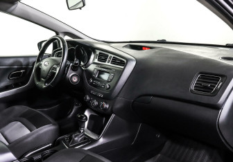 Подержанный автомобиль Kia Ceed Hatchback 2014 года (10 фото)