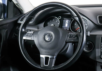 Подержанный автомобиль Volkswagen Passat Wagon 2014 года (12 фото)