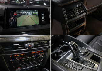 Подержанный автомобиль BMW X6 2015 года (18 фото)