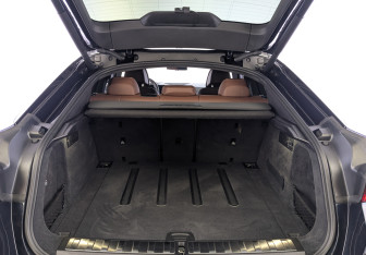 Подержанный автомобиль BMW X6 2025 года (10 фото)