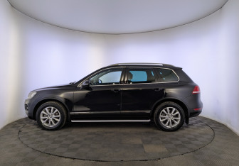 Подержанный автомобиль Volkswagen Touareg 2014 года (8 фото)