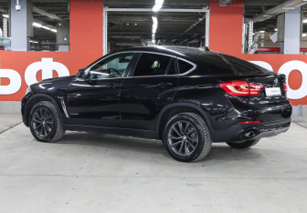 Подержанный автомобиль BMW X6 2015 года (7 фото)