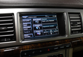 Подержанный автомобиль Jaguar XF Sedan 2011 года (19 фото)