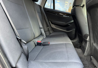 Подержанный автомобиль BMW X1 2010 года (11 фото)