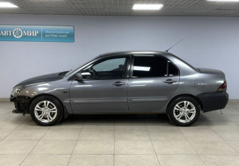 Подержанный автомобиль Mitsubishi Lancer Sedan 2009 года (8 фото)