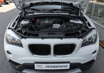 Подержанный автомобиль BMW X1 2013 года (9 фото)