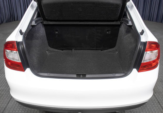 Подержанный автомобиль Skoda Rapid Liftback 2014 года (10 фото)