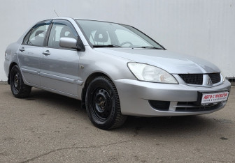 Подержанный автомобиль Mitsubishi Lancer Sedan 2009 года (3 фото)
