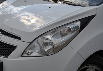 Подержанный автомобиль Chevrolet Spark 2012 года (17 фото)