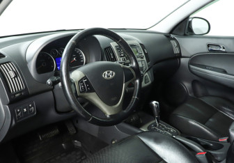 Подержанный автомобиль Hyundai i30 Hatchback 2009 года (13 фото)