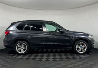 Подержанный автомобиль BMW X5 2015 года (6 фото)