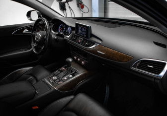 Подержанный автомобиль Audi A6 allroad 2012 года (27 фото)