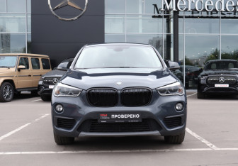 Подержанный автомобиль BMW X1 2015 года (2 фото)