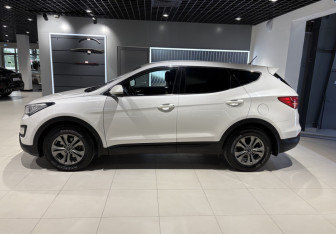Подержанный автомобиль Hyundai Santa Fe 2014 года (3 фото)