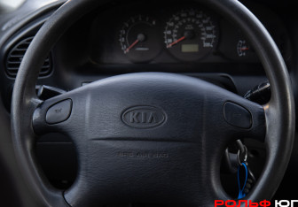 Подержанный автомобиль Kia Spectra Sedan 2006 года (12 фото)