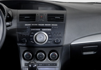 Подержанный автомобиль Mazda 3 Hatchback 2009 года (13 фото)