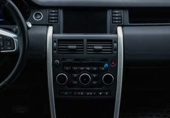 Подержанный автомобиль Land Rover Discovery Sport 2015 года (14 фото)
