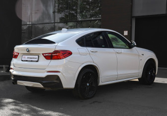 Подержанный автомобиль BMW X4 2015 года (5 фото)