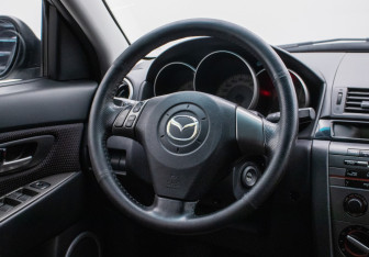 Подержанный автомобиль Mazda 3 Hatchback 2007 года (15 фото)
