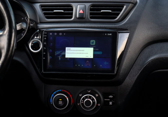 Подержанный автомобиль Kia Rio Sedan 2014 года (12 фото)