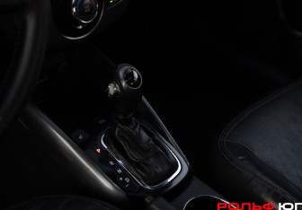 Подержанный автомобиль Kia Forte Coupe 2013 года (12 фото)
