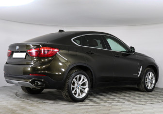 Подержанный автомобиль BMW X6 2015 года (2 фото)