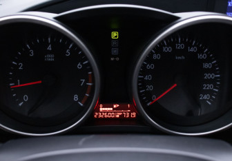 Подержанный автомобиль Mazda 3 Sedan 2010 года (12 фото)