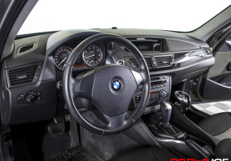 Подержанный автомобиль BMW X1 2012 года (16 фото)