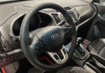 Подержанный автомобиль Kia Sportage 2010 года (13 фото)