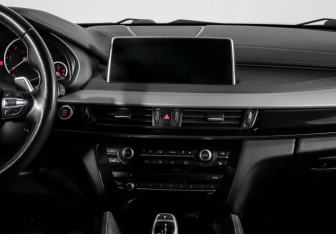 Подержанный автомобиль BMW X6 2018 года (13 фото)