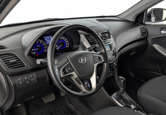 Подержанный автомобиль Hyundai Solaris Sedan 2014 года (15 фото)