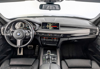 Подержанный автомобиль BMW X5 2014 года (14 фото)