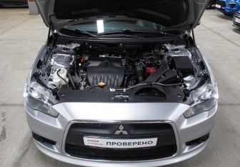 Подержанный автомобиль Mitsubishi Lancer Sedan 2011 года (9 фото)