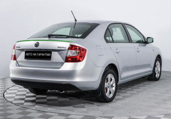 Подержанный автомобиль Skoda Rapid Liftback 2014 года (5 фото)