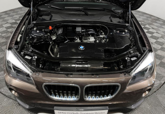 Подержанный автомобиль BMW X1 2014 года (9 фото)