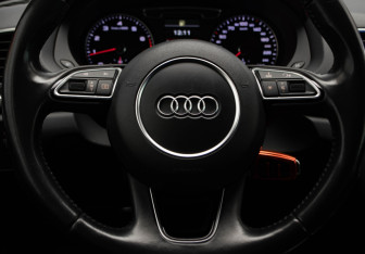 Подержанный автомобиль Audi Q3 2015 года (10 фото)