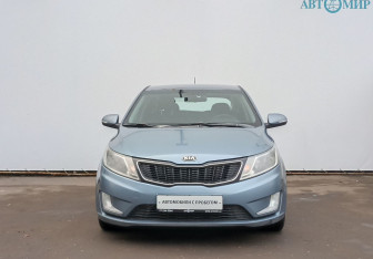 Подержанный автомобиль Kia Rio Hatchback 2013 года (2 фото)
