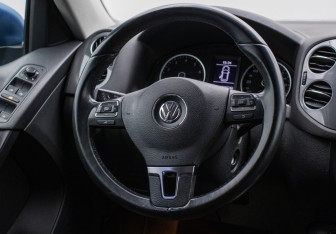 Подержанный автомобиль Volkswagen Tiguan 2014 года (15 фото)