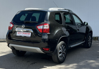 Подержанный автомобиль Nissan Terrano 2015 года (5 фото)