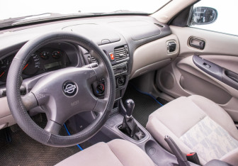 Подержанный автомобиль Nissan Almera Sedan 2002 года (9 фото)