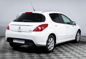 Подержанный автомобиль Peugeot 308 Hatchback 2012 года (5 фото)