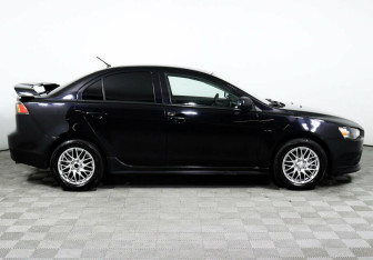 Подержанный автомобиль Mitsubishi Lancer Sedan 2013 года (4 фото)