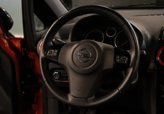 Подержанный автомобиль Opel Corsa 2013 года (11 фото)