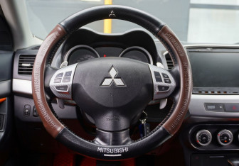 Подержанный автомобиль Mitsubishi Lancer Sedan 2008 года (13 фото)