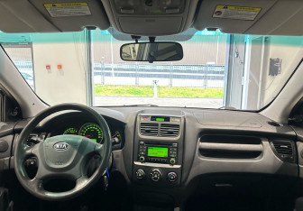 Подержанный автомобиль Kia Sportage 2009 года (16 фото)
