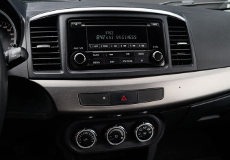 Подержанный автомобиль Mitsubishi Lancer Sedan 2014 года (13 фото)