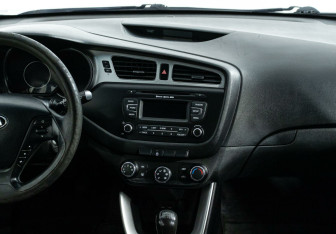 Подержанный автомобиль Kia Ceed Wagon 2015 года (8 фото)