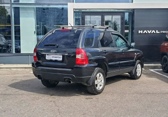 Подержанный автомобиль Kia Sportage 2010 года (5 фото)