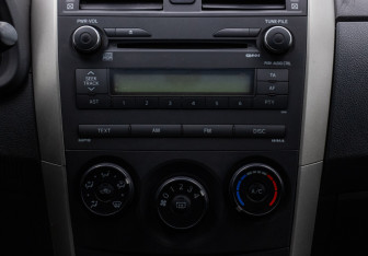 Подержанный автомобиль Toyota Corolla Sedan 2008 года (14 фото)