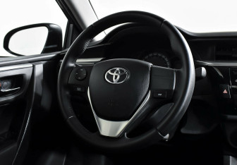 Подержанный автомобиль Toyota Corolla Sedan 2014 года (12 фото)